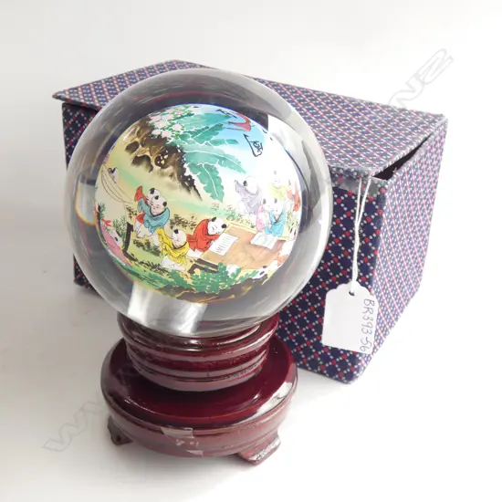 ORIENTAL REVERSE HAND PAINTED GLASS BALL ON WOODEN STAND (BOXED H. 170MM)