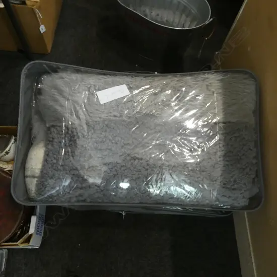 GREY SHEEPSKINS IN BAG 