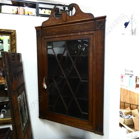 ANTIQUE PEDIMENTED GLAZED CORNER CABINET...