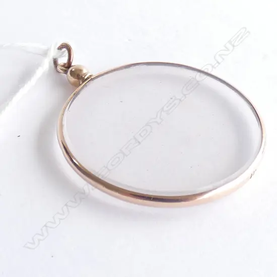9 CT GOLD LOCKET PENDANT WITH GLASS COVERS DIA  32MM