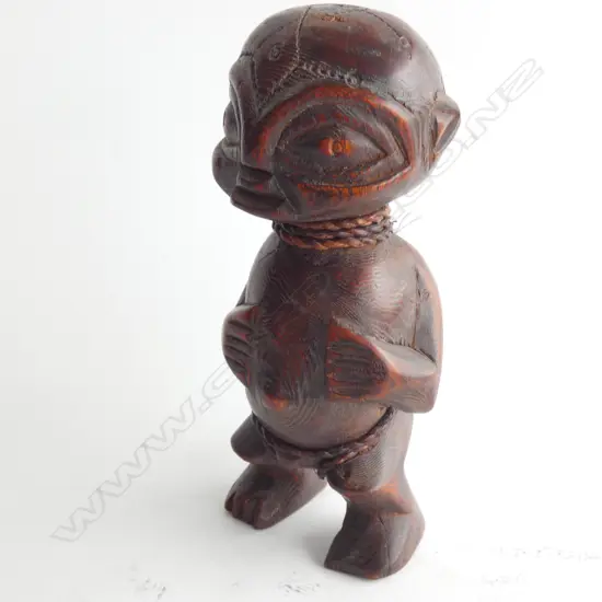 CARVED WOODEN AFRICAN STANDING FIGURE, REDDISH STAINED. H.220mm