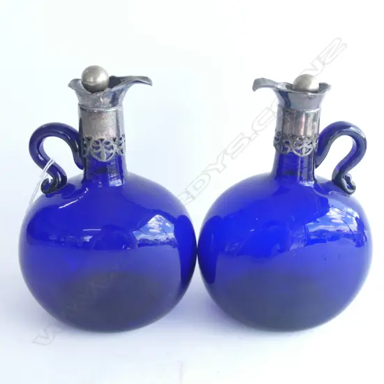 PR COBALT BLUE GLASS DECANTER JUGS WITH SILVER PLATE COLLARS & STOPPERS H. 225MM