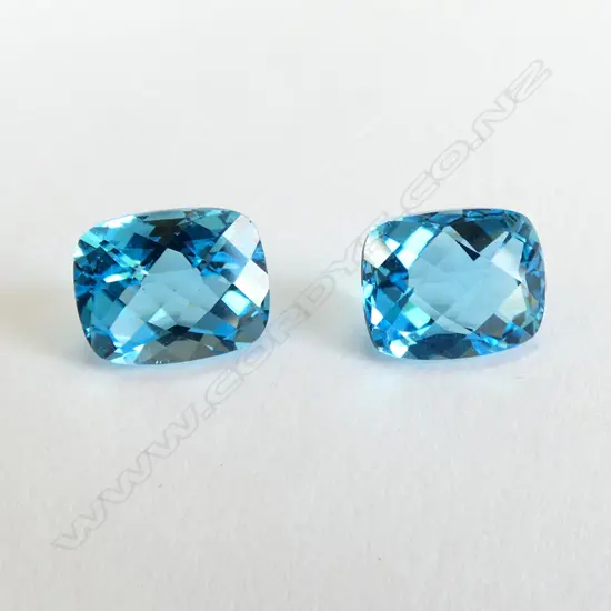 PAIR OF BLUE TOPAZ STONES - UNSET & CHEQUERBD CUT