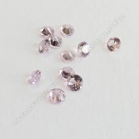 ELEVEN UNSET PINK SAPPHIRES 