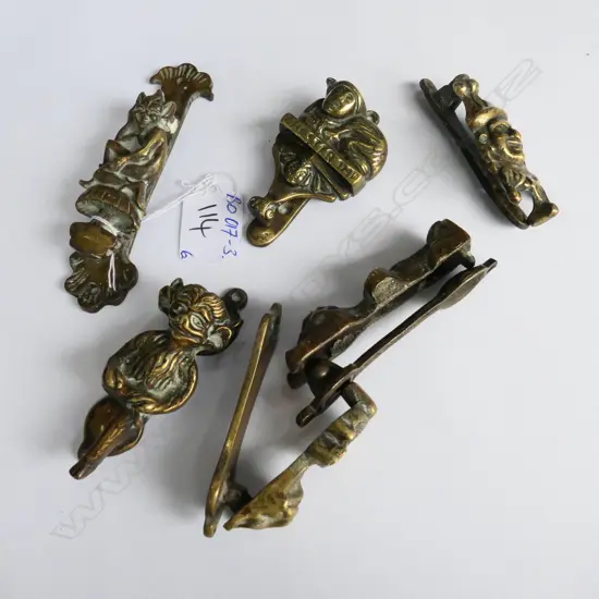 Six small Victorian brass door knockers
