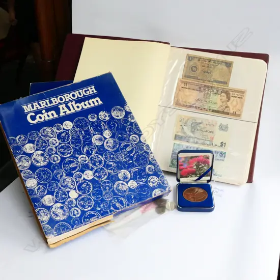 NZ/INTERNATION COIN ALBUM PLUS 1990 COMMONWEALTH GAMES MEDAL