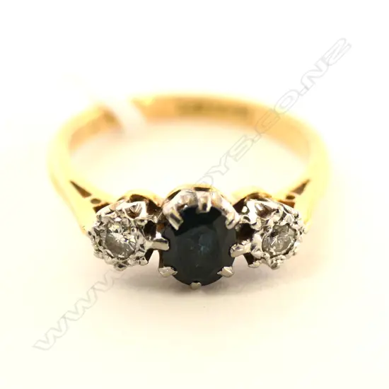 18CT GOLD SAPPHIRE AND DIAMOND RING
