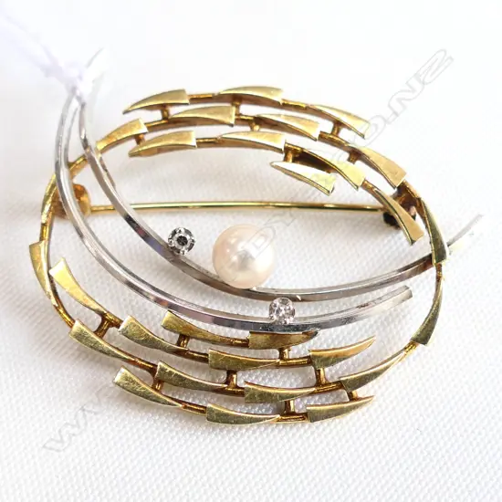 A c.1960s/70s German 14ct. gold diamond and pearl brooch