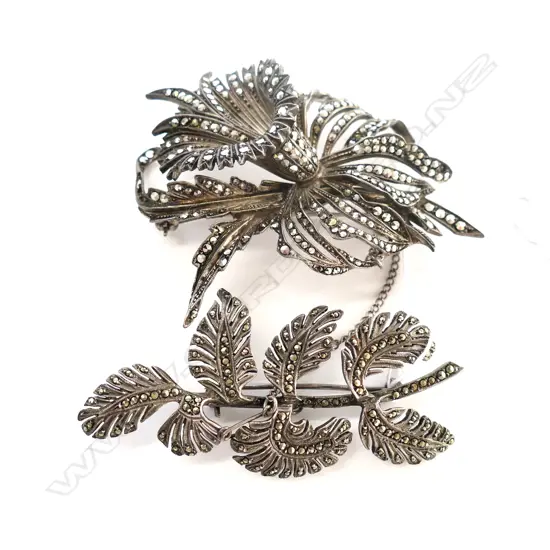 TWO SILVER AND MARCASITE BROOCHES