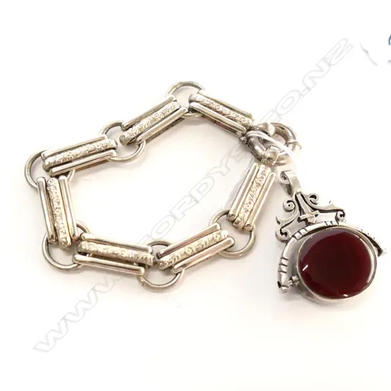 ANTIQUE STYLE SILVER BRACELET AND CARNELIAN SPINNER