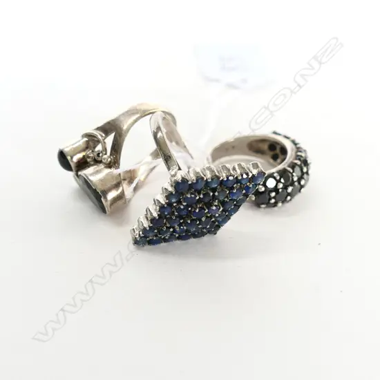 THREE SILVER GEMSTONE SET RINGS