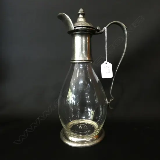 AN ANTIQUE  PEWTER JUG H. 300MM