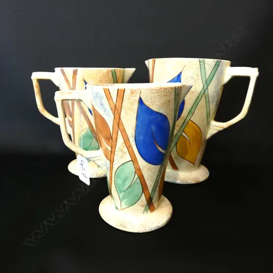 THREE KENSINGTON POTTERY JUGS, TALLEST H.180MM