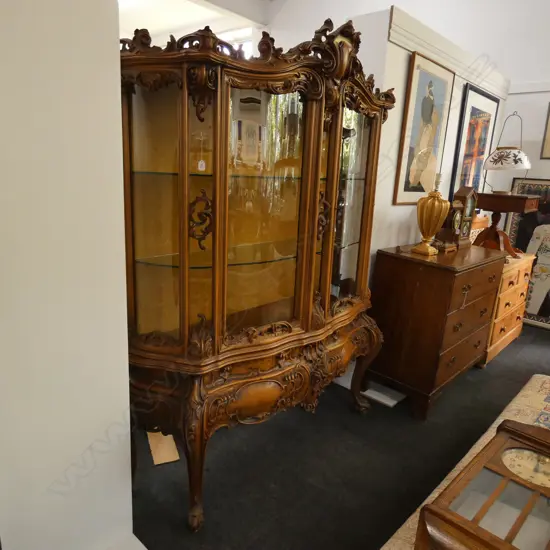 HEAVILY CARVED FRENCH STYLE CABINET WITH GLASS SHELVES H. 2200MM W. 1650MM 