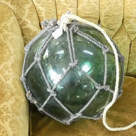 OLD LARGE GLASS FISHING FLOAT WITH NETTING