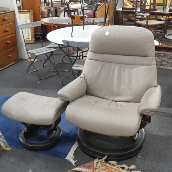 EKORNES NORWAY LEATHER UPHOLSTERED ARMCHAIR AND STOOL