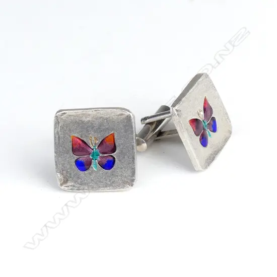 A pair of Chinese silver and enamel cufflinks