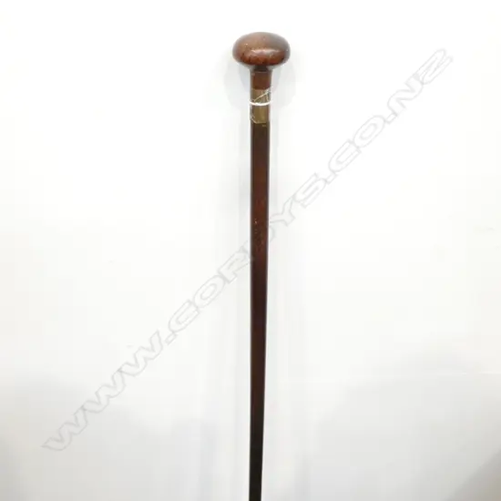 ROSEWOOD AND BRASS WALKING STICK L. 880MM