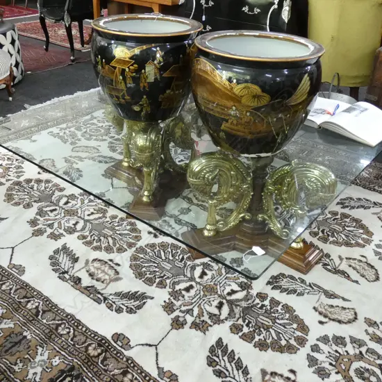 GLASS TOP COFFEE TABLE WITH 2 GILDED AND MAHOGANY SUPPORTS 1390 SQ