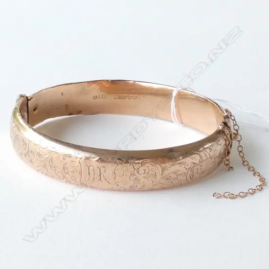 9CT GOLD HINGED BANGLE 23.02gm (dented)