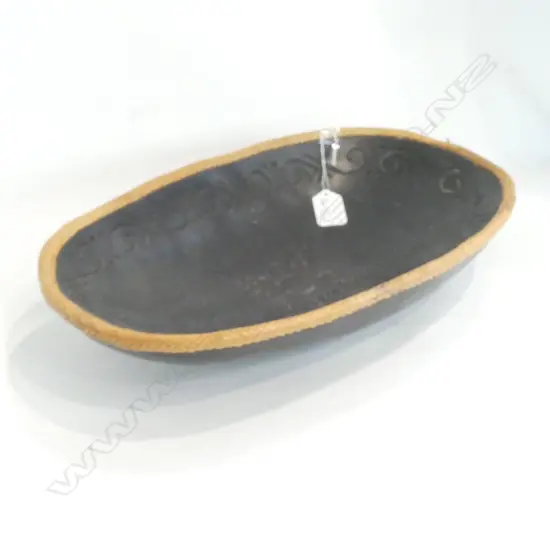 A PACIFIC SERVING BOWL WITH WOVEN EDGE