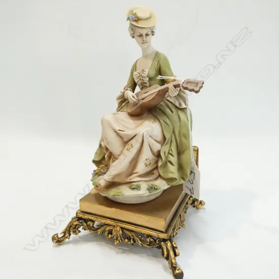 TRIADE FIGURE LADY PLAYING GUITAR