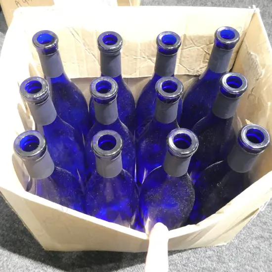 BOX LOT 12 BLUE WINE BOTTLES