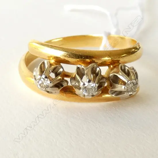 18CT GOLD AND THREE STONE DIAMOND RING