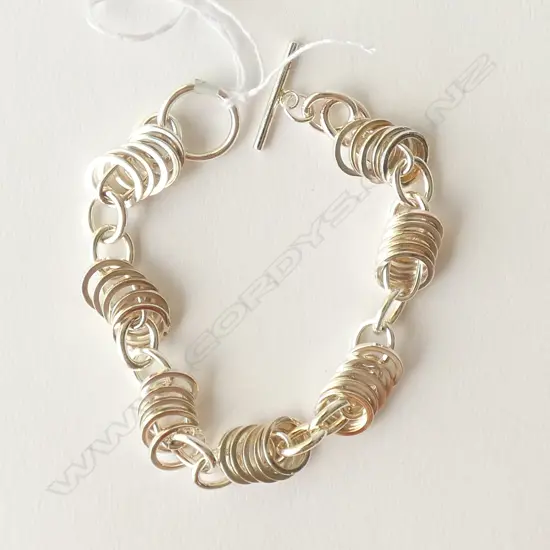 SILVER O RING STYLE BRACELET T & O RING CLASP  22GMS