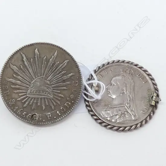 2 LARGE SILVER COINS ENGLAND AND MEXICO, IN MOUNTS