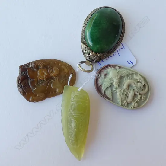 4 CHINESE STONE PENDANTS 