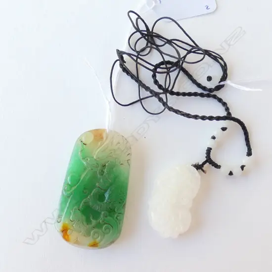 SIMULATED JADITE PLAQUE AND WHITE LOTUS PENDANT 