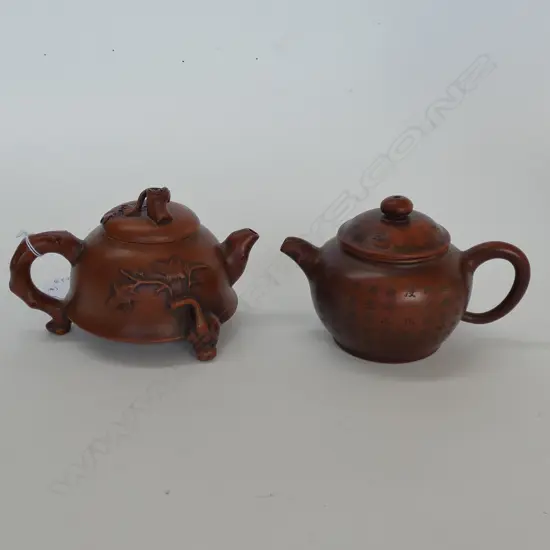 TWO SMALL CHINESE POTTERY TEAPOTS, LARGEST 110mm LONG
