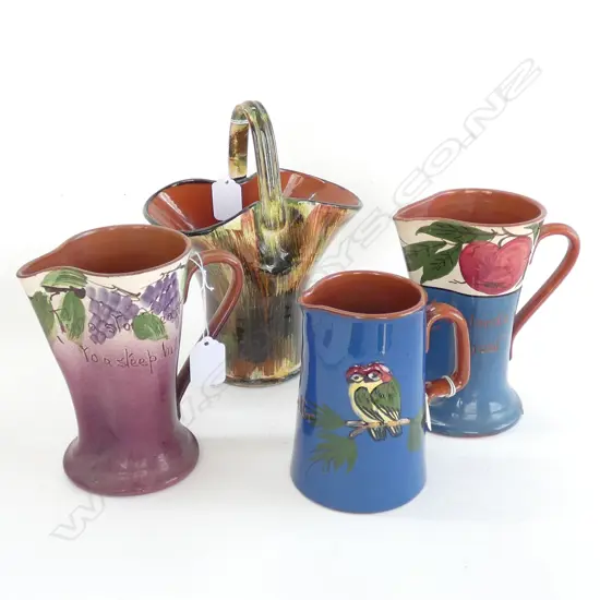 4 PCES TORQUAY WARE; 3 JUGS & HANDLED VASE H. 220MM