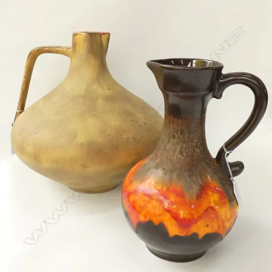 2 WEST GERMAN CERAMIC JUGS LARGEST 300MM DIA