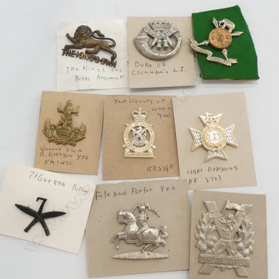 BAG 9 MILITARY BADGES NAMED ON CARD...