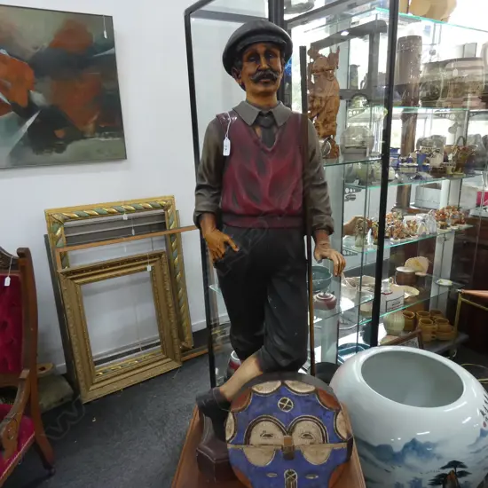 SHOP FIGURE OF A GOLFER
