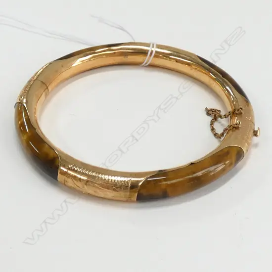 TIGERS EYE BANGLE  IN 14 CT GOLD MOUNTS