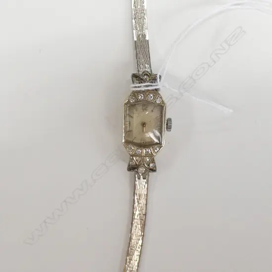 COCKTAIL WATCH, LADIES 18CT WHITE GOLD AND DIAMONDS