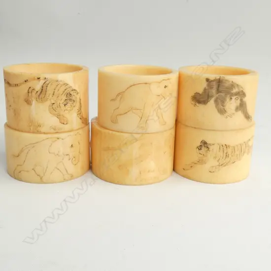 6 IVORY NAPKIN RINGS