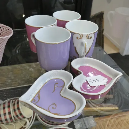 2 CHRISTIAN LACRIOX  HART SHAPED DISHES + 4 COFFEE CANS