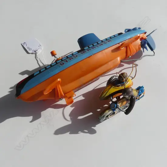 (3) 2 TOYS 1 PLASTIC ‘GYRO MARINER’ AND METAL GERMAN MOTORCYCLE AND SIDECAR