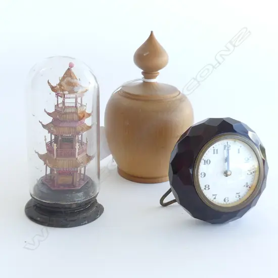 (15) 3 ITEMS WOOD TURNED ITEM, PAGODA UNDER GLASS + RED GLASS? TRAVEL CLOCK