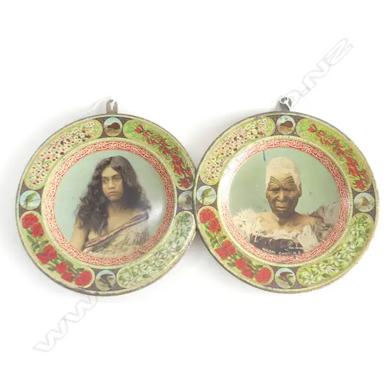 (40) 2 x ILES PHOTOGRAPHY TIN WALL HANGINGS DEPICTING A MAORI CHIEF & A MAORI MAIDEN & LOCAL FLORA AND BIRDS D. 255mm