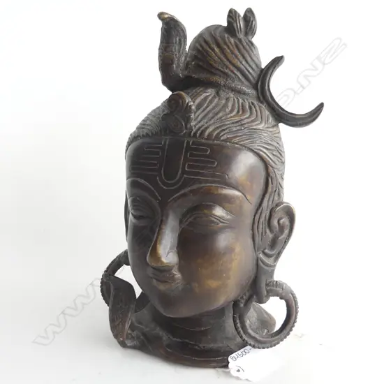(23) A BRONZE HEAD OF SHIVA H. 240mm