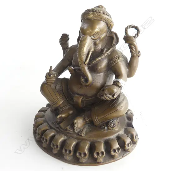 (14) A BRASS SEATED STATUE OF GANESH H. 160mm