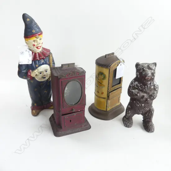 (9) 4 MONEY BOXES 1 CAST IRON REPRO CLOWN H. 240mm + 1 TIN PASCALS AMBROSIA  + 1 TIN WITH NURSERY FIGURES + 1 REPRO BEAR