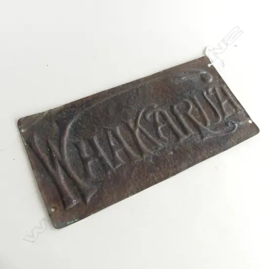 A COPPER SIGN 'WHAKARUA' IN NOUVEAU SCRIPT TRANSLATES TO 'NORTH EASTERLY BREEZE' H. 180 x 360mm