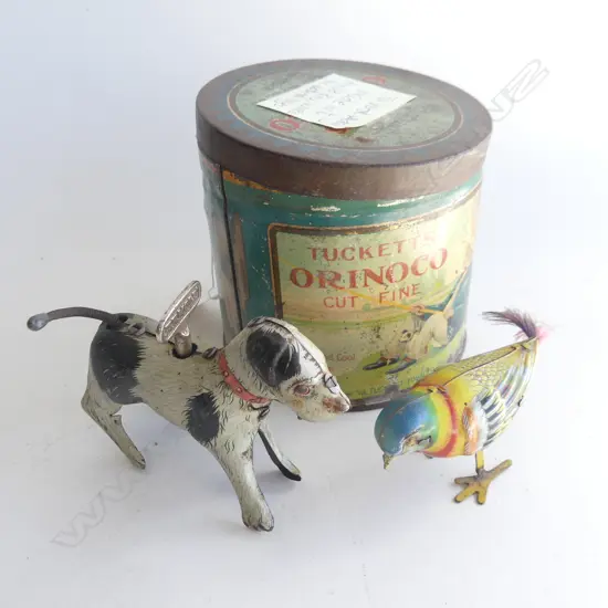 (82) TUCKETTS TOBACO TIN & 2 TIN TOYS DOG & BIRD