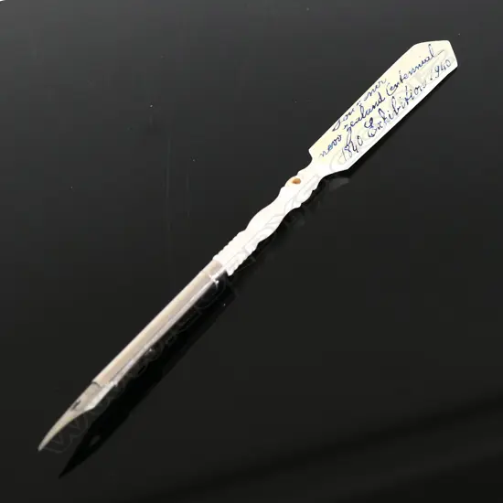 Souvenir turned bone Letter Opener and Writing Pen from the NZ Centennial Exhibition, Wellington, 1940.